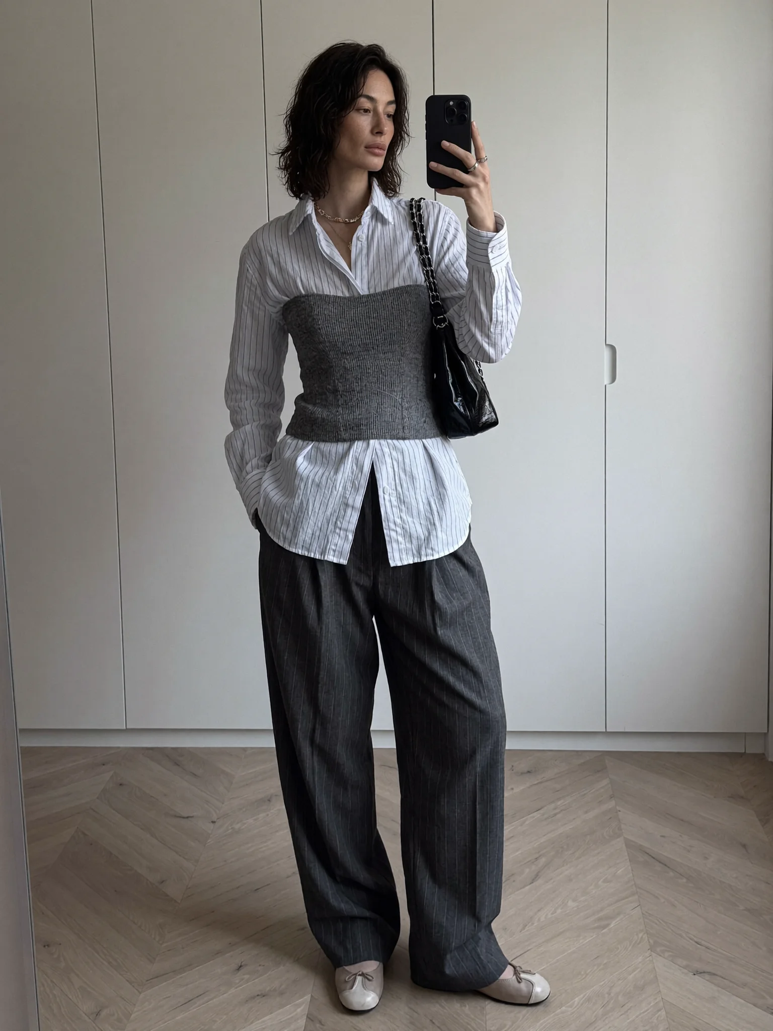 Minimalist layered fashion mirror selfie prompt